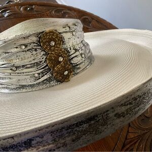 Vintage, white hat w/antiqued silver trim, wide stiff brim very unusual
